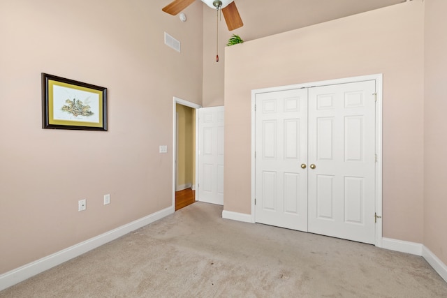 139 Delissa Dr, Georgetown, KY 40324 - unfurnished bedroom with carpet, a towering ceiling, a closet, and ceiling fan