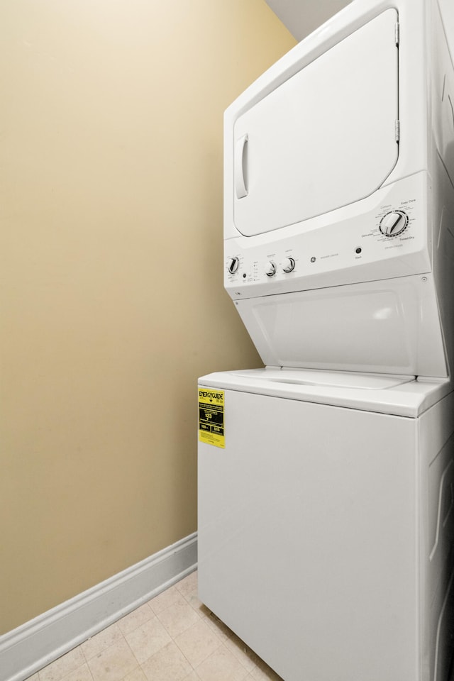 139 Delissa Dr, Georgetown, KY 40324 - washroom with stacked washer / drying machine and light tile patterned floors