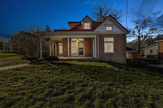 236 W High St, Mt Sterling, KY 40353 - view of front facade with covered porch, brick siding, crawl space, and a front lawn