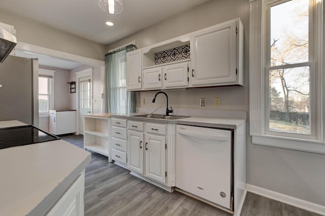 236 W High St, Mt Sterling, KY 40353 - kitchen featuring white dishwasher, freestanding refrigerator, open shelves, white cabinetry, and light countertops