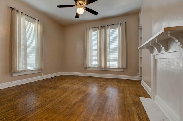 236 W High St, Mt Sterling, KY 40353 - empty room featuring hardwood / wood-style floors, ceiling fan, and plenty of natural light