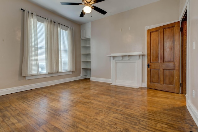 236 W High St, Mt Sterling, KY 40353 - unfurnished room with a ceiling fan and hardwood / wood-style flooring