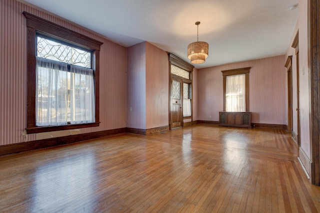 236 W High St, Mt Sterling, KY 40353 - empty room with hardwood / wood-style flooring and plenty of natural light