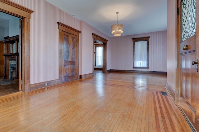 236 W High St, Mt Sterling, KY 40353 - empty room with wood-type flooring and baseboards