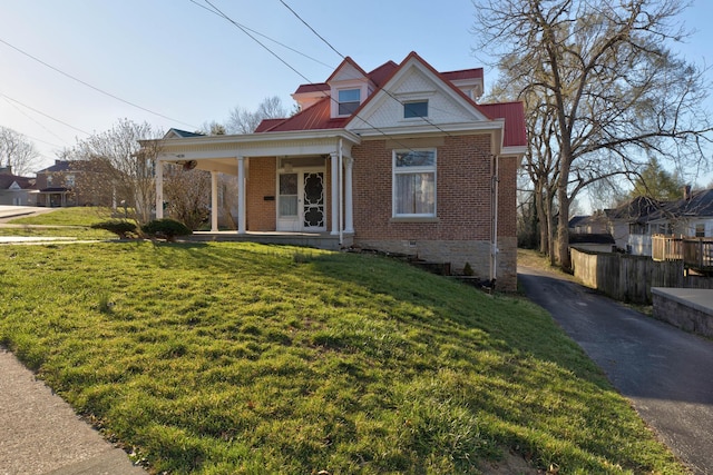 236 W High St, Mt Sterling, KY 40353 - view of front facade featuring covered porch, brick siding, driveway, and a metal roof