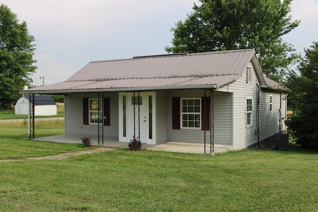 2721 E Ringgold, Somerset, KY 42503 - view of front of property featuring covered porch, a front yard, and a metal roof