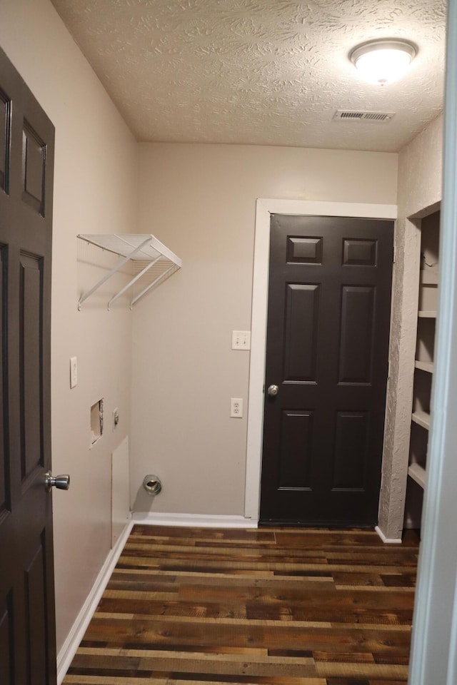 2721 E Ringgold, Somerset, KY 42503 - laundry room with dark wood-type flooring and a textured ceiling