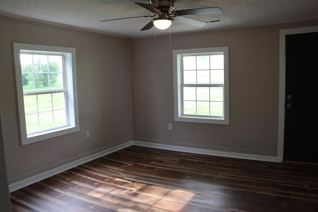 2721 E Ringgold, Somerset, KY 42503 - spare room featuring healthy amount of natural light, dark wood-type flooring, ceiling fan, and crown molding