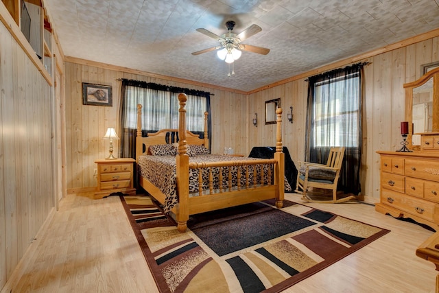 69 Side Run Rd, Wellington, KY 40387 - bedroom featuring wood finished floors, wood walls, and crown molding