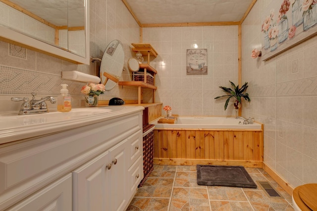 69 Side Run Rd, Wellington, KY 40387 - full bath with tile walls, a garden tub, vanity, and backsplash