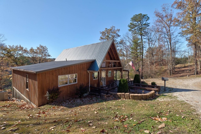 69 Side Run Rd, Wellington, KY 40387 - view of side of home with a metal roof