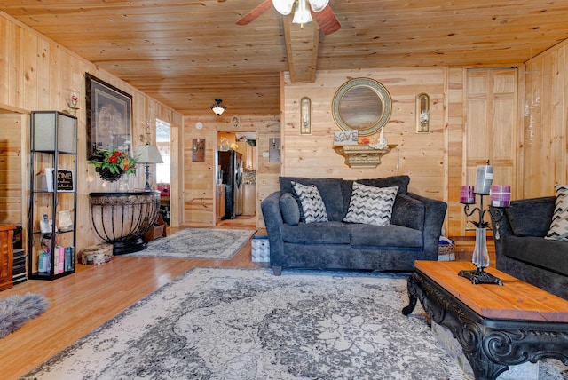 69 Side Run Rd, Wellington, KY 40387 - living area featuring wooden ceiling, wooden walls, wood finished floors, and a ceiling fan