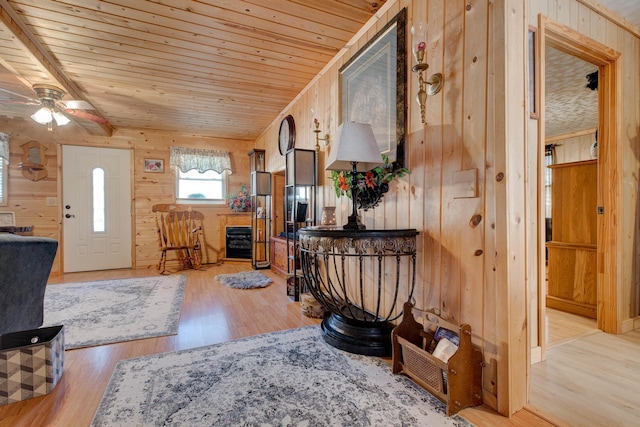 69 Side Run Rd, Wellington, KY 40387 - foyer with wooden walls, light wood-style flooring, wooden ceiling, and ceiling fan