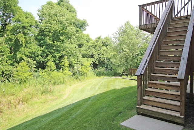 101 Corolla Cir, Georgetown, KY 40324 - view of grassy yard featuring stairs and a wooden deck