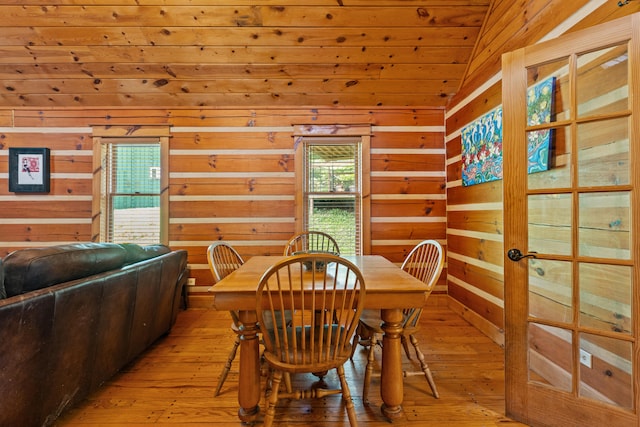 1836 Red Lick Rd, Berea, KY 40403 - dining area with lofted ceiling, light wood finished floors, wooden walls, and wooden ceiling