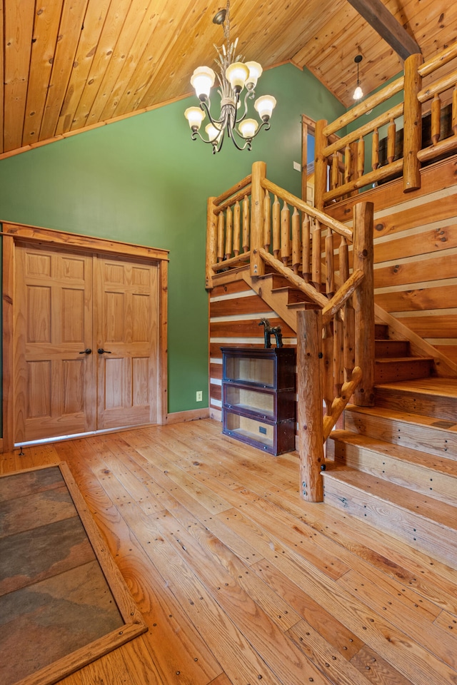 1836 Red Lick Rd, Berea, KY 40403 - stairs with wood ceiling, hardwood / wood-style floors, a chandelier, and high vaulted ceiling