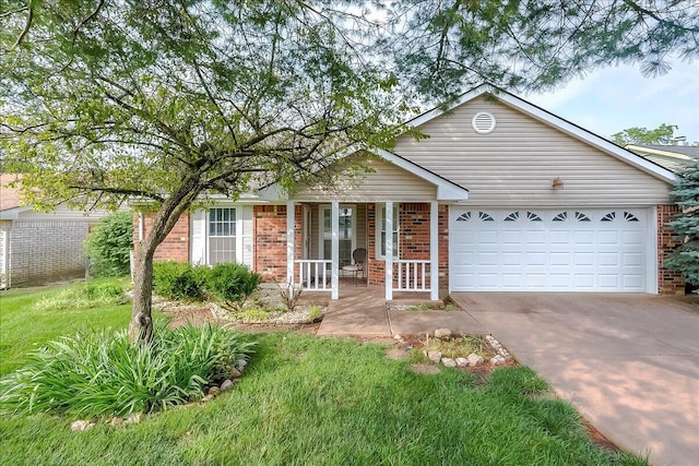 396 Squires Cir, Lexington, KY 40515 - single story home featuring brick siding, covered porch, concrete driveway, and an attached garage