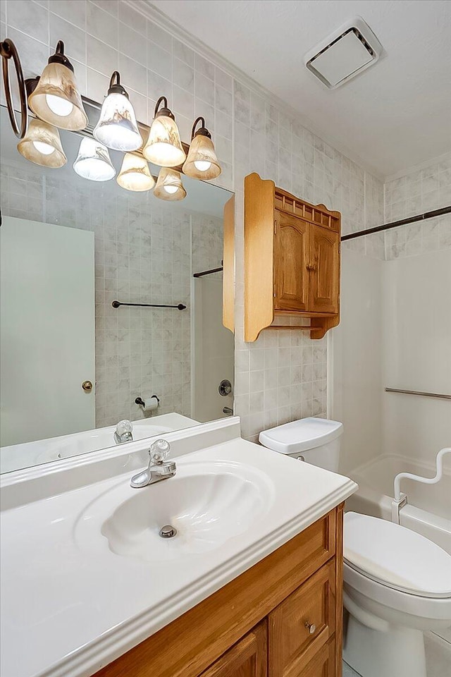 396 Squires Cir, Lexington, KY 40515 - full bathroom featuring vanity, shower / bath combination, and tile walls