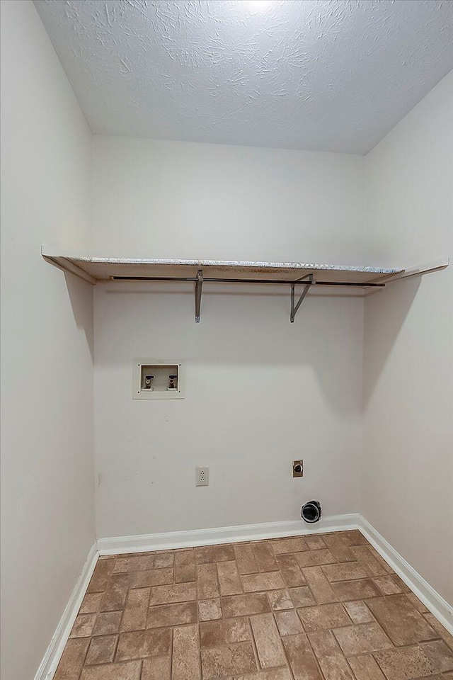 396 Squires Cir, Lexington, KY 40515 - washroom featuring electric dryer hookup, washer hookup, and brick patterned flooring
