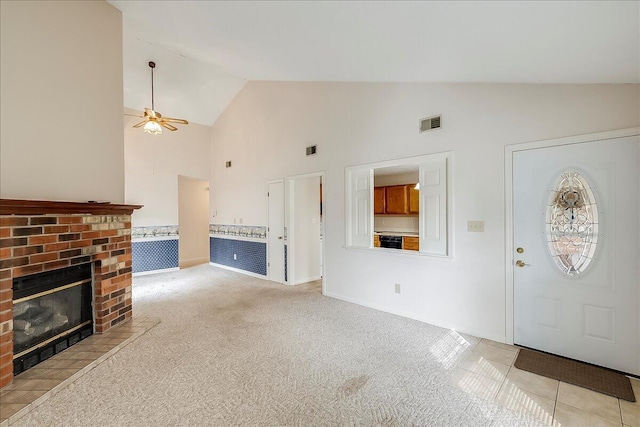 396 Squires Cir, Lexington, KY 40515 - unfurnished living room featuring high vaulted ceiling, a ceiling fan, a brick fireplace, light colored carpet, and light tile patterned flooring