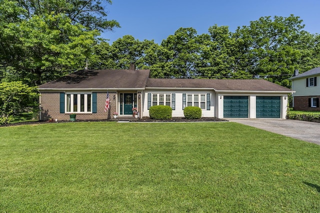 331 Clearbrook Dr, Danville, KY 40422 - view of front of property featuring an attached garage, a front yard, concrete driveway, and a chimney