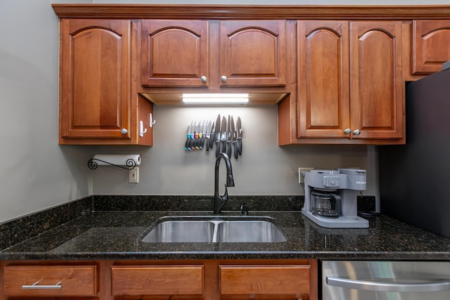 4368 River Oak Trl, Lexington, KY 40515 - kitchen featuring stainless steel dishwasher, dark stone counters, and brown cabinets