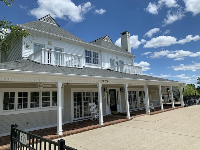 4368 River Oak Trl, Lexington, KY 40515 - back of property with a balcony, french doors, a chimney, and a shingled roof