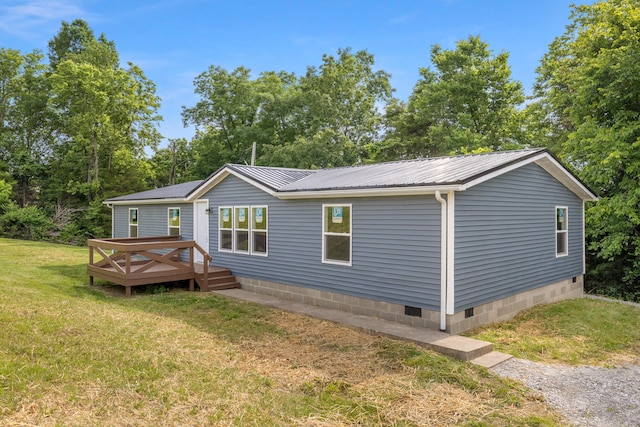 174 Sky Ln, Cynthiana, KY 41031 - back of property featuring crawl space, a deck, a lawn, and a metal roof