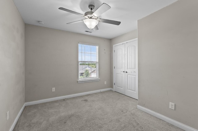 136 Meadowcrest Dr, Georgetown, KY 40324 - unfurnished bedroom with carpet flooring, a closet, and a ceiling fan