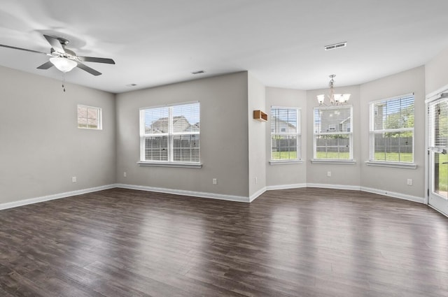 136 Meadowcrest Dr, Georgetown, KY 40324 - unfurnished living room with a chandelier, dark wood-style flooring, and healthy amount of natural light