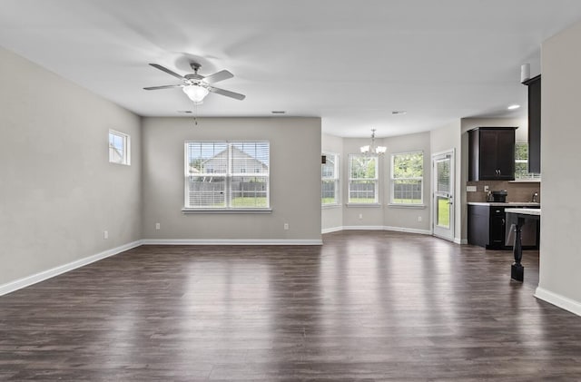 136 Meadowcrest Dr, Georgetown, KY 40324 - unfurnished living room featuring a chandelier, dark wood finished floors, and ceiling fan