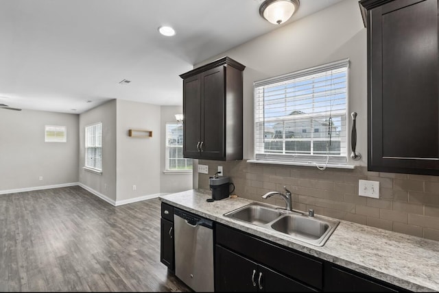 136 Meadowcrest Dr, Georgetown, KY 40324 - kitchen with stainless steel dishwasher, dark wood-style floors, backsplash, light countertops, and recessed lighting