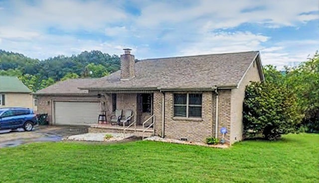 529 S 2nd St, Williamsburg, KY 40769 - ranch-style house with a garage, a chimney, a front yard, brick siding, and driveway