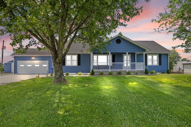 9209 W Hwy 80, Nancy, KY 42544 - view of front of home featuring covered porch, driveway, and a yard