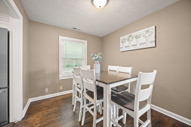 9209 W Hwy 80, Nancy, KY 42544 - dining space featuring wood finished floors and a textured ceiling