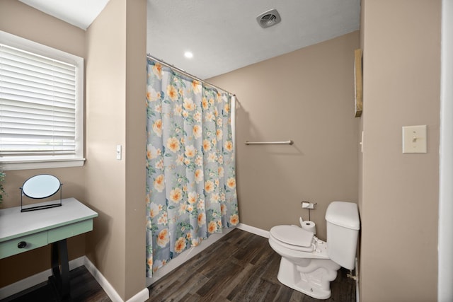 9209 W Hwy 80, Nancy, KY 42544 - full bathroom with wood finished floors and a shower with shower curtain