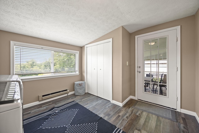 9209 W Hwy 80, Nancy, KY 42544 - doorway to outside with a baseboard radiator, wood finished floors, and a textured ceiling