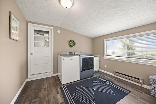 9209 W Hwy 80, Nancy, KY 42544 - laundry area featuring a baseboard radiator, a textured ceiling, dark wood finished floors, washer and clothes dryer, and cabinet space