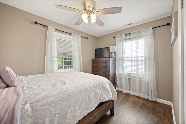 9209 W Hwy 80, Nancy, KY 42544 - bedroom with dark wood finished floors and ceiling fan
