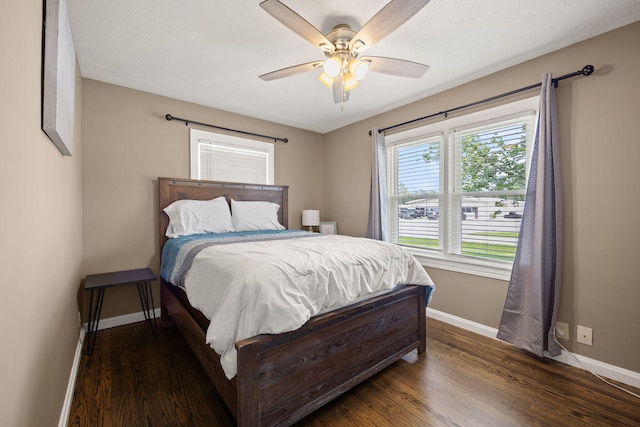 9209 W Hwy 80, Nancy, KY 42544 - bedroom with wood finished floors and a ceiling fan