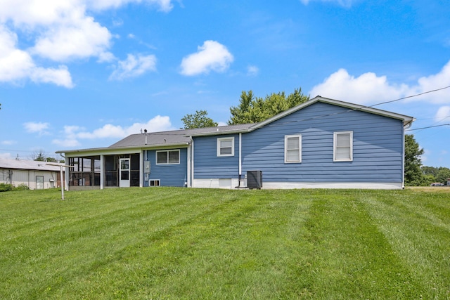 9209 W Hwy 80, Nancy, KY 42544 - rear view of house with a sunroom, a lawn, and a metal roof