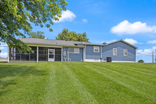 9209 W Hwy 80, Nancy, KY 42544 - back of house featuring a sunroom, a yard, and a metal roof