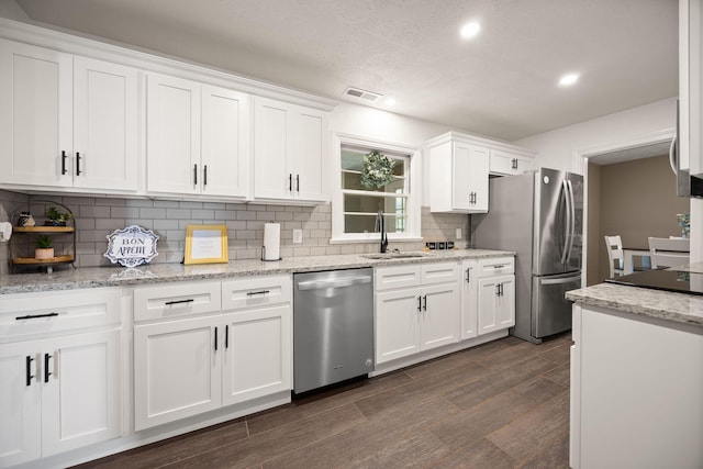 9209 W Hwy 80, Nancy, KY 42544 - kitchen featuring stainless steel appliances, dark wood-style floors, white cabinetry, decorative backsplash, and recessed lighting