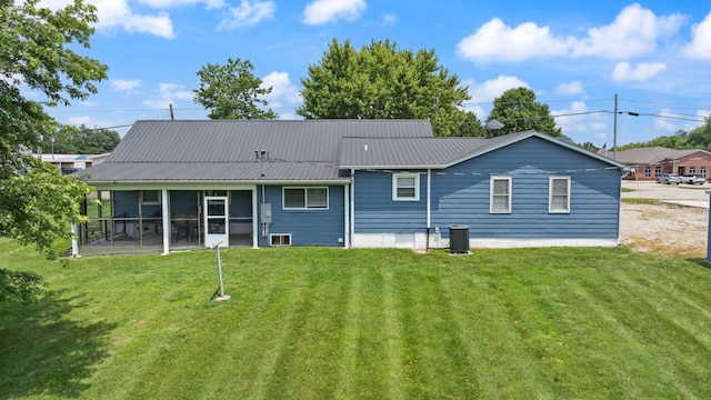 9209 W Hwy 80, Nancy, KY 42544 - back of property featuring a sunroom, a lawn, and a metal roof
