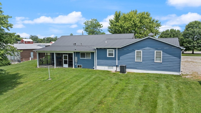 9209 W Hwy 80, Nancy, KY 42544 - back of house featuring a yard, a sunroom, and a metal roof