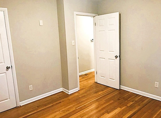 1984 Greenleaf Dr, Lexington, KY 40505 - empty room with wood finished floors and baseboards