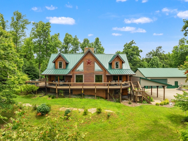 1564 High Ridge Rd, Middleburg, KY 42541 - rear view of house with a chimney, a metal roof, a yard, and a deck