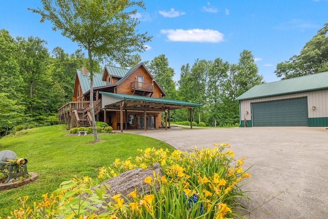 1564 High Ridge Rd, Middleburg, KY 42541 - exterior space featuring stairs, a yard, a detached garage, and a metal roof