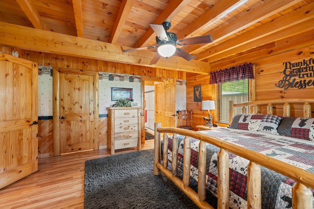 1564 High Ridge Rd, Middleburg, KY 42541 - bedroom with wooden walls, light wood finished floors, and a wooden ceiling with exposed beams