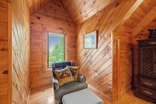 1564 High Ridge Rd, Middleburg, KY 42541 - sitting room featuring wood walls, vaulted ceiling, and light wood finished floors